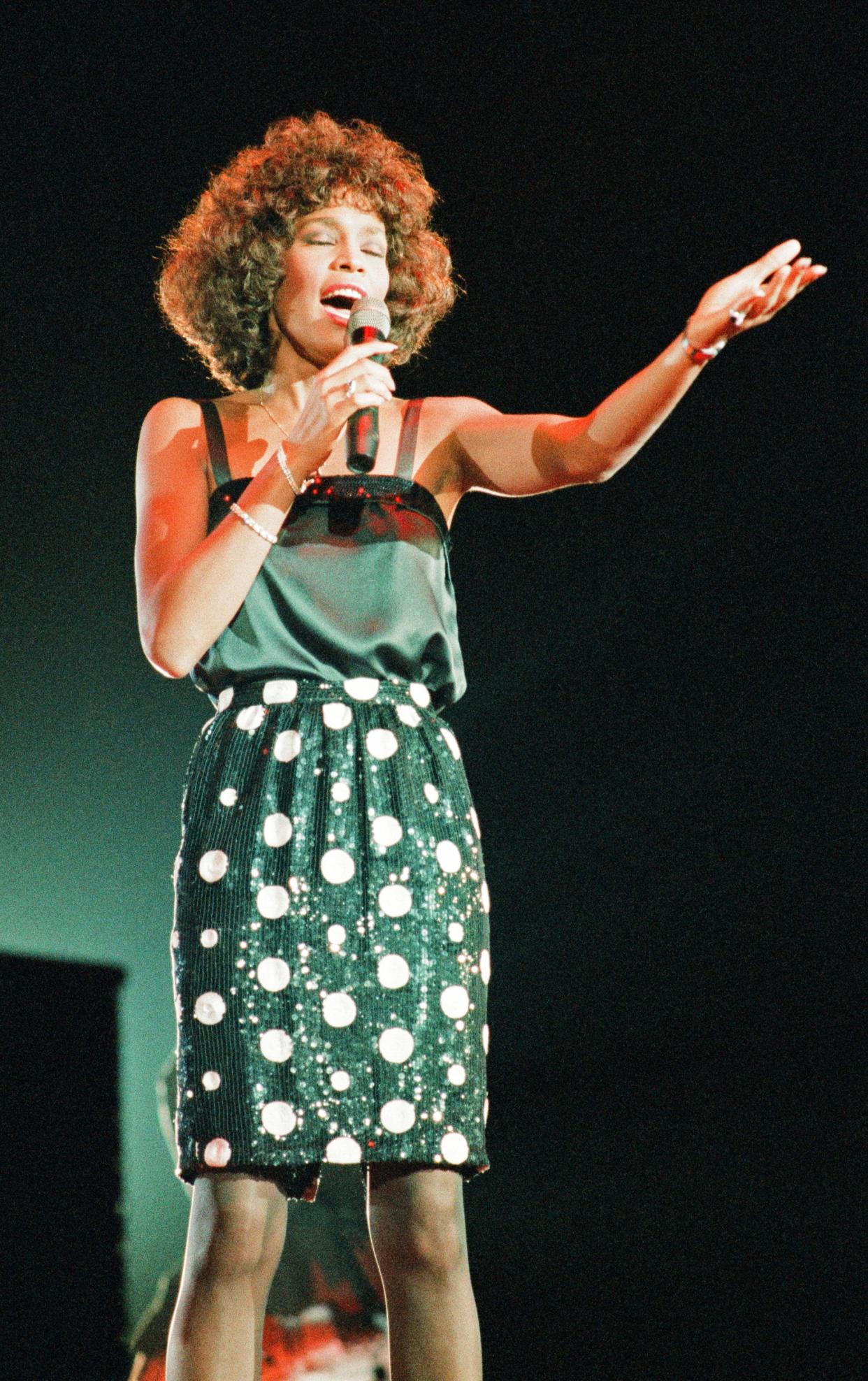 Whitney Houston, seen here performing in 1987, died in 2012. (Photo: Williams/Mirrorpix/Getty Images)