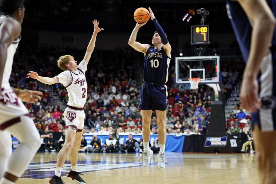 Penn State Nittany Lions guard Andrew Funk (10) shoots the ball against Texas A&M Aggies guard Hayden Hefner (2) during the first half at Wells Fargo Arena.