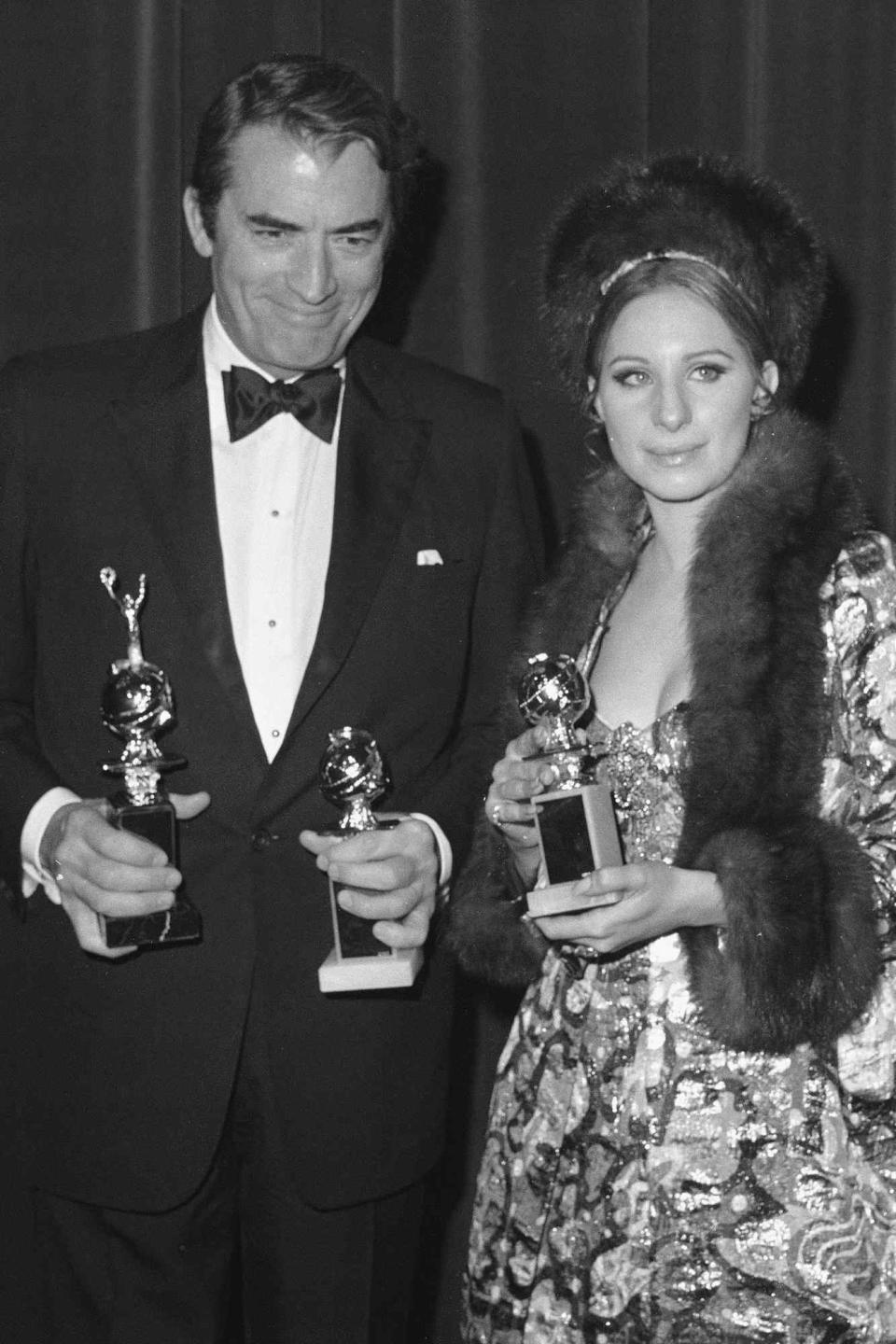 <p>Gregory Peck (left, with Barbra Streisand) won the Cecil B. DeMille Award in 1969.</p>