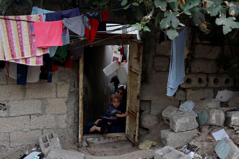 The Wider Image: Gaza struggles to accommodate the living and the dead as population grows