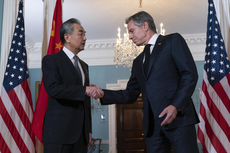 Secretary of State Antony Blinken shake hands with People's Republic of China Foreign Minister Wang Yi after a bilateral meeting at the State Department in Washington, Thursday, Oct. 26, 2023. (AP Photo/Jose Luis Magana)