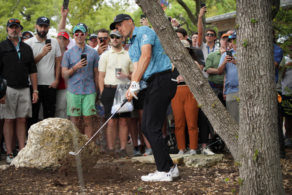 Jordan Spieth hits from the trees during his 2-and-1 loss Thursday to Taylor Montgomery. In his eight previous Dell Match Play appearances, he has broken out of group play only three times. And he's got his work cut out for him this year, facing a must-win match Friday.