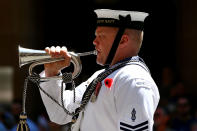 <p>A member of the HMAS Waterhen and Royal Australian Navy Band plays The Last Post during the Remembrance Day Service held at the Cenotaph, Martin Place on Nov. 11, 2017 in Sydney, Australia. (Photo: Lisa Maree Williams/Getty Images) </p>