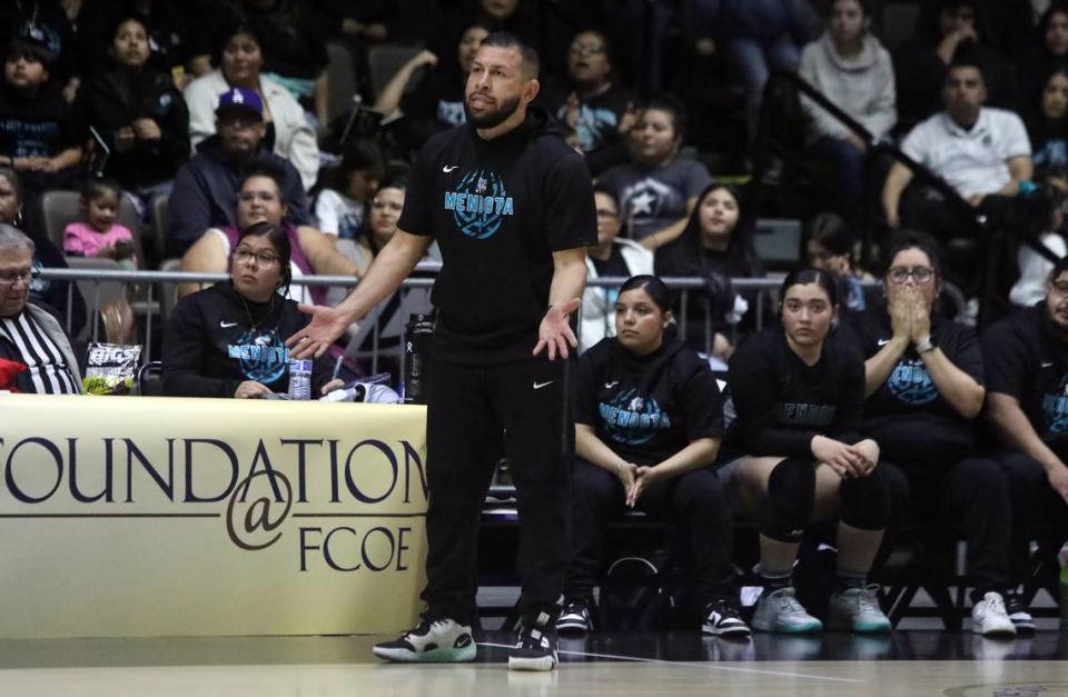 Mendota High coach José Reyes gestures after a call during the CIF Central Section Division IV championship game against Immanuel High at Selland Arena on Feb. 23, 2024. Immanuel won, 41-29.