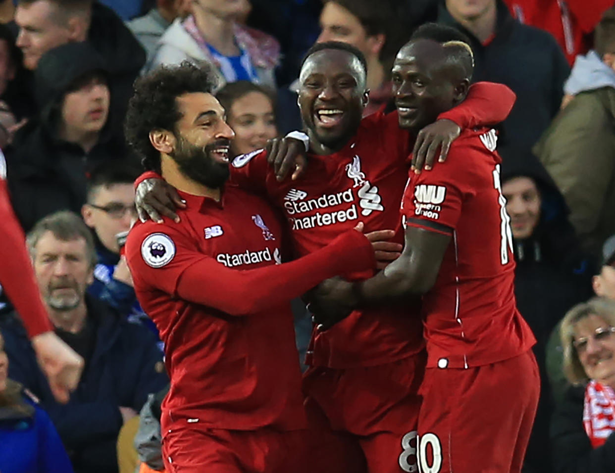 Naby Keita of Liverpool celebrates his opening goal with team mates Mohamed Salah and Sadio Mane