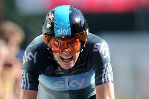 Great Britain's Christopher Froome competes at the end of the 41,5 km individual time-trial and ninth stage of the 2012 Tour de France cycling race starting in Arc-et-Senans and finishing in Besancon, eastern France