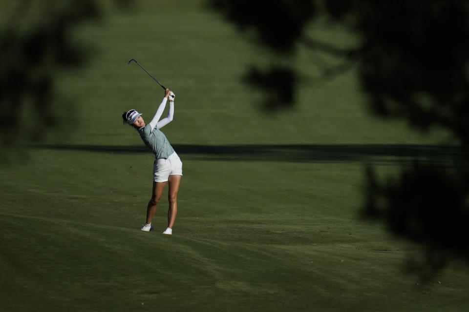 Grace Kim hits from the 16th fairway during the third round of the LPGA's JM Eagle LA Championship golf tournament at Wilshire Country Club, Saturday, April 27, 2024, in Los Angeles. (AP Photo/Ashley Landis)