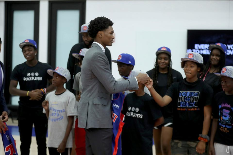 Detroit Pistons draft pick Ausar Thompson greets area youth after an introductory news conference at the Henry Ford Detroit Pistons Performance Center, Friday, June 23, 2023.