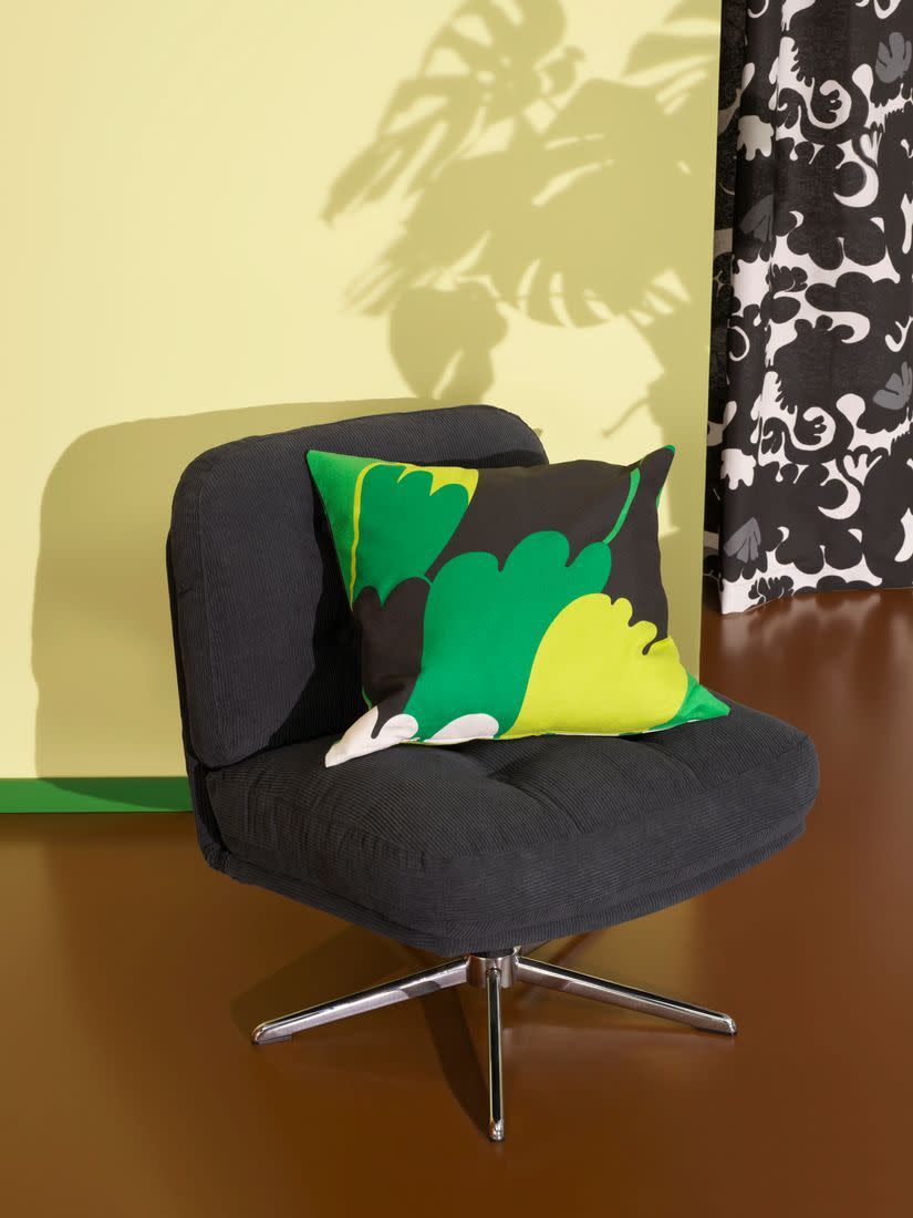 a chair with a pillow on it