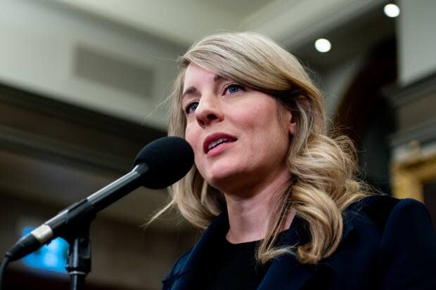 Minister of Foreign Affairs Melanie Joly speaks to reporters in the foyer of the House of Commons on Parliament Hill in Ottawa, on Monday, March 18, 2024.