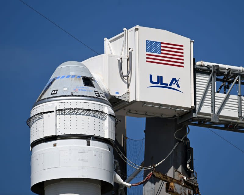 The Boeing Starliner spacecraft sits atop a ULA Atlas V rocket as it prepares to launch the Starliner's first crewed mission from Complex 41 at the Cape Canaveral Space Force Station.  Photo by Joe Marino/UPI