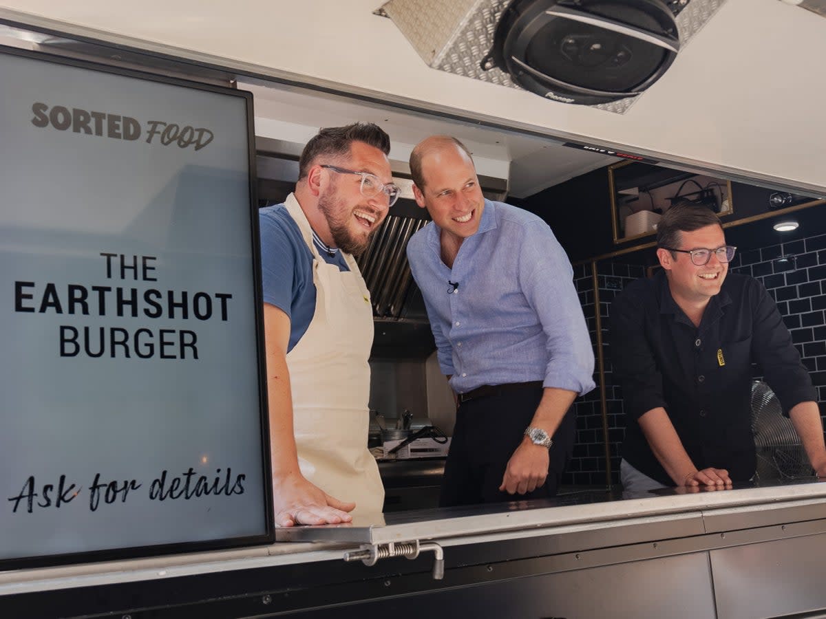 The Prince of Wales during the filming of a Youtube video where he left diners opened mouthed when he unexpectedly dished up veggie burgers made with Earthshot Prize winning products (PA)