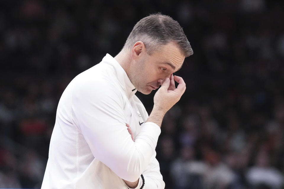 Toronto Raptors head coach Darko Rajakovic reacts during his team's loss to the Atlanta Hawks in NBA basketball game action in Toronto, Friday, Dec. 15, 2023. (Chris Young/The Canadian Press via AP)
