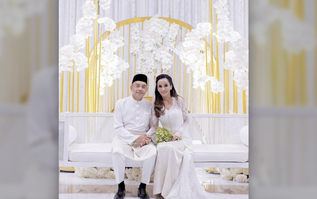 Nazir Razak in a wedding photo with his current wife, Yati Zainudin.