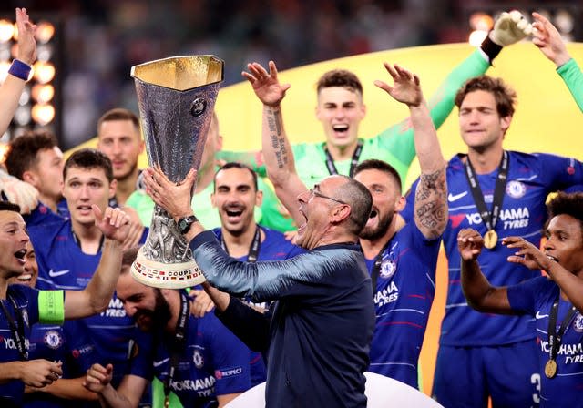 Chelsea manager Maurizio Sarri celebrates with the trophy after the UEFA Europa League final in Baku