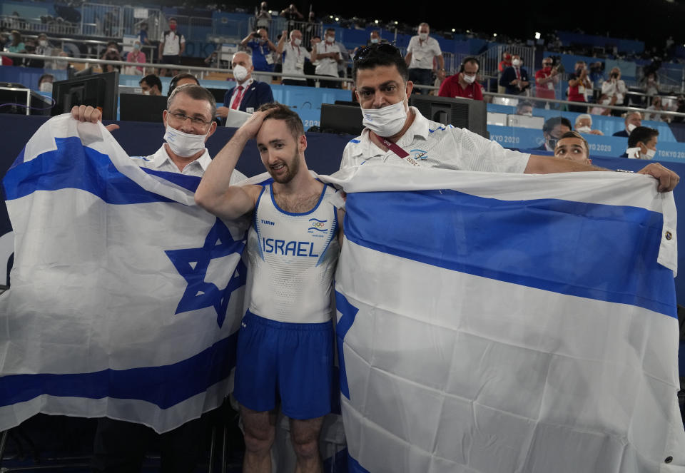 Artem Dolgopyat of Israel, celebrates after winning the gold medal on the floor exercise during the artistic gymnastics men's apparatus final at the 2020 Summer Olympics, Sunday, Aug. 1, 2021, in Tokyo. (AP Photo/Natacha Pisarenko)