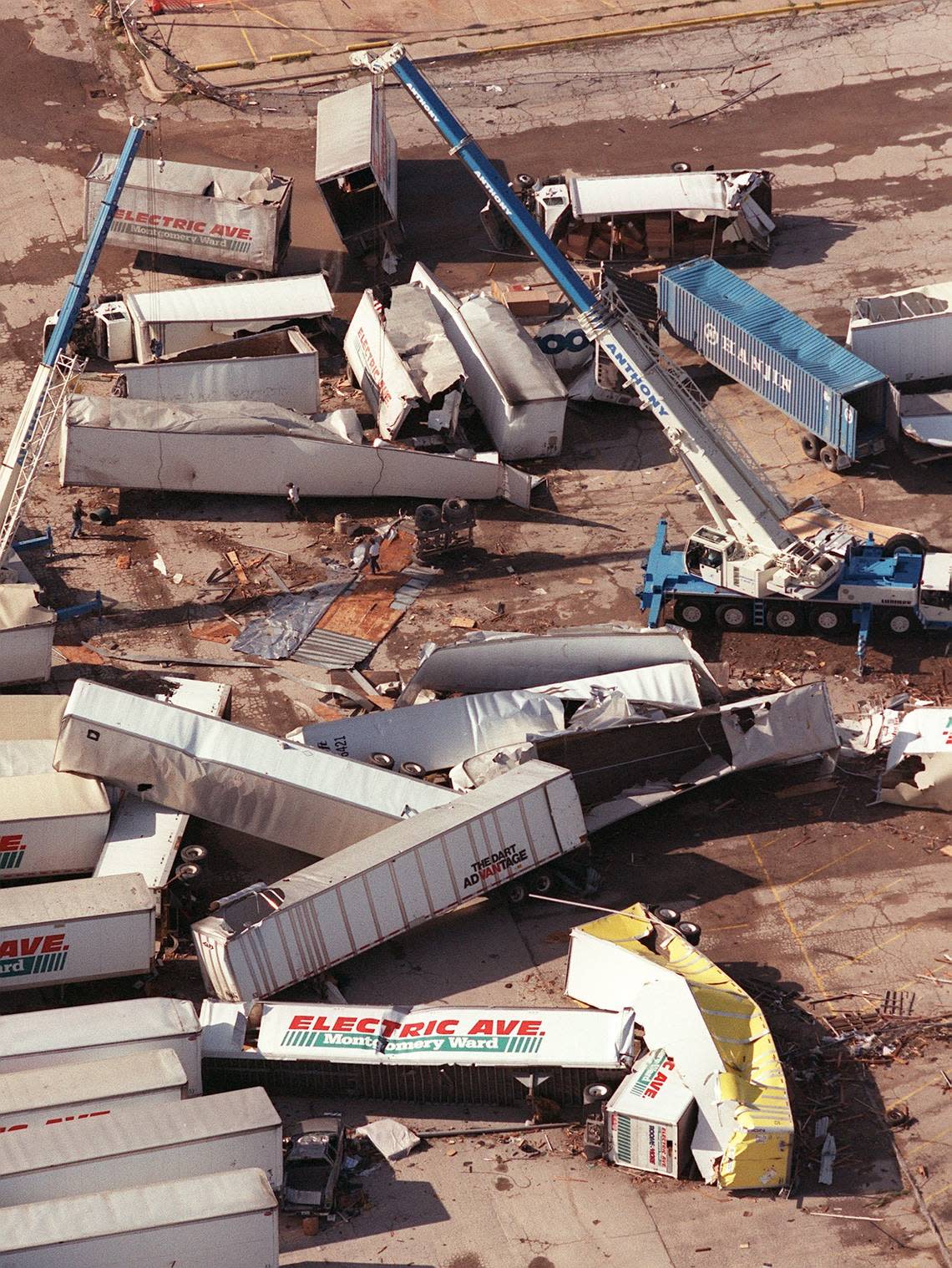 Large trucks were tossed in the March 28, 2000 tornado at the Montgomery Ward loading docks. The loading docks and warehouse were torn down to make room for Super Target and other retail shops at what is now Montgomery Plaza. l
