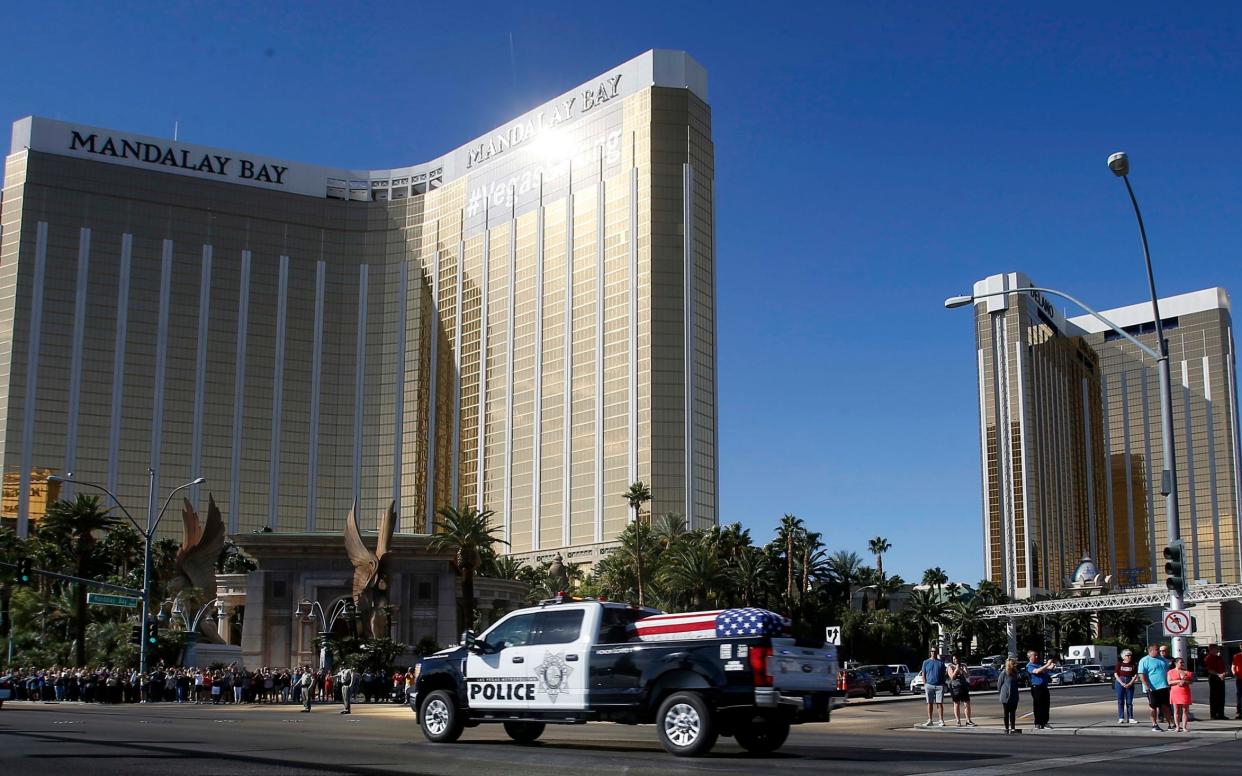 The funeral procession for Las Vegas police officer Charleston Hartfield passes the Mandalay Bay hotel - FR159466 AP