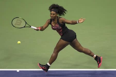 Serena Williams of the U.S. hits a return to Vitalia Diatchenko of Russia during their match at the U.S. Open Championships tennis tournament in New York, August 31, 2015. REUTERS/Adrees Latif