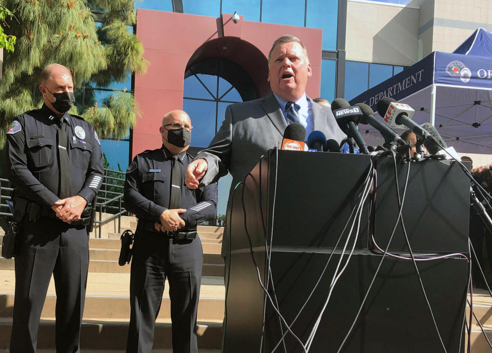 City of Orange Mayor Mark Murphy talks during a news conference at the Orange Police Department headquarters in Orange, Calif., Thursday, April 1, 2021. A child was among four people killed Wednesday in a shooting at a Southern California office building that left a fifth victim wounded and the gunman critically injured, police said. (AP Photo/Stefanie Dazio)