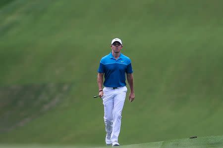 May 17, 2015; Charlotte, NC, USA; Rory McIlroy walks towards the green alone in the lead during the final round at Quail Hollow Club. Mandatory Credit: Jim Dedmon-USA TODAY Sports