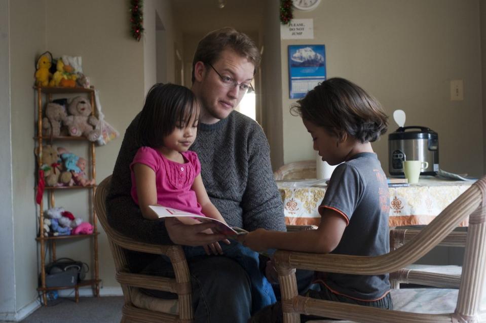 <p>A grad student at Johns Hopkins volunteered as a tutor for Bhutanese refugees in Riverdale, Maryland, in December 2011.</p>