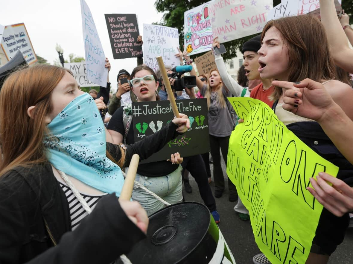 Scenes like this one, outside the U.S. Supreme Court in Washington, D.C., in May 2022, could start happening outside pharmacies in the U.S. this week, as chains begin selling abortion pills. (Kevin Dietsch/Getty Images - image credit)