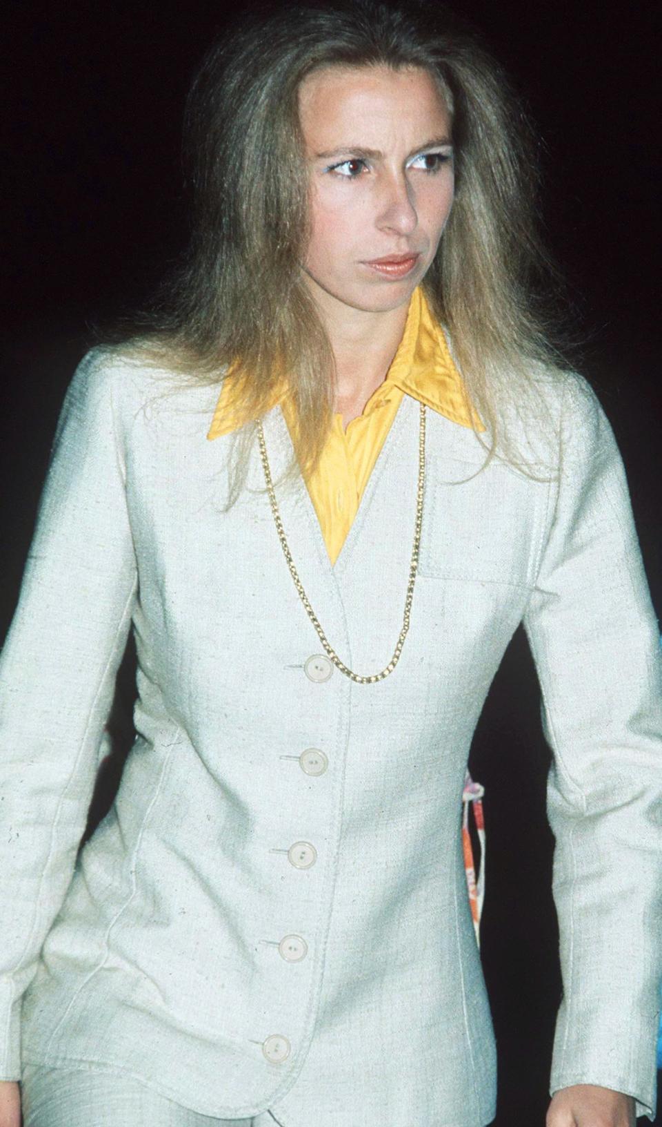 PRINCESS ANNE WEARING A TROUSER SUIT ON A VISIT TO THE THEATRE in September 1973