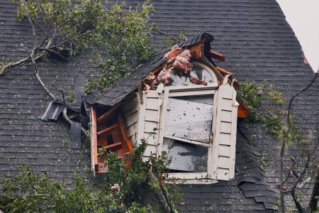 A damaged house is seen after Hurricane Florence struck in Winnabow, North Carolina, U.S., September 15, 2018. REUTERS/Jonathan Drake