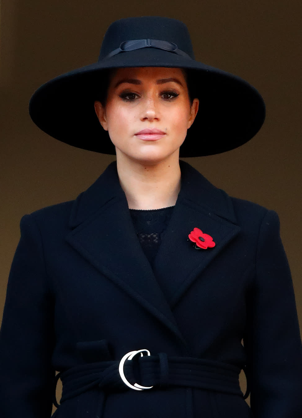 Meghan attends Remembrance Sunday service in a Stella McCartney coat.