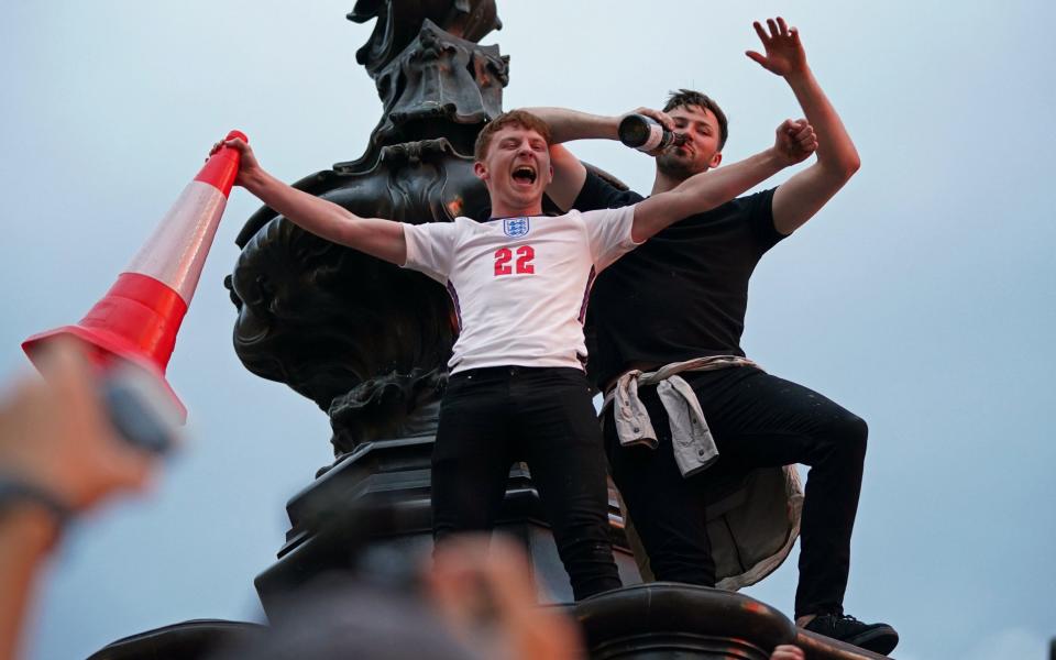 England fans go wild in central London - PA