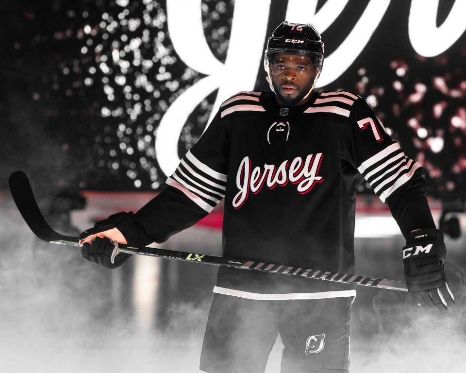 Devils defenseman P.K. Subban shows off the team's new third jersey which will be worn for the first time on Nov. 28 against the Philadelphia Flyers.