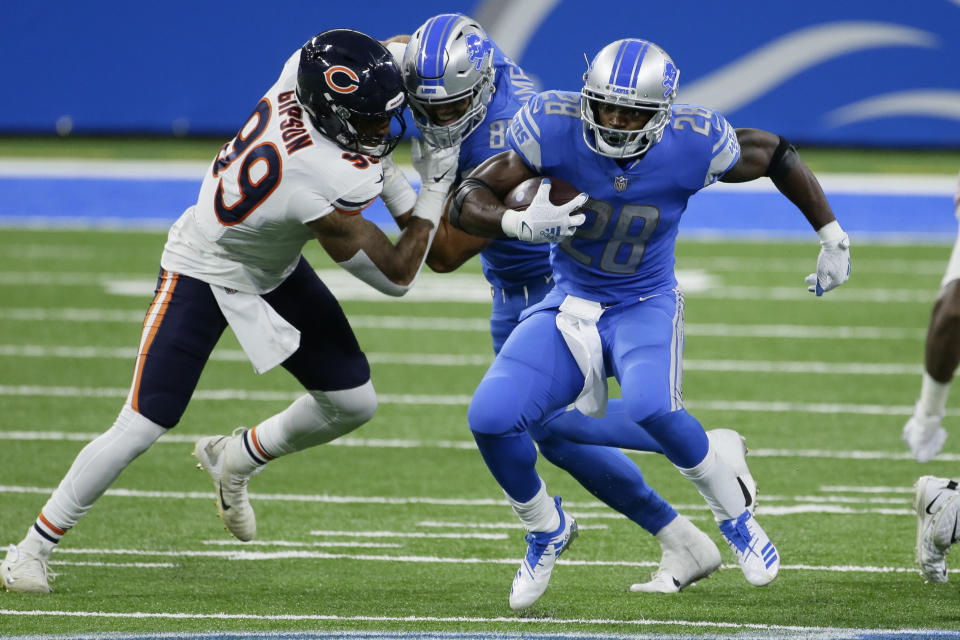 Detroit Lions running back Adrian Peterson (28) runs against the Chicago Bears in the second half of an NFL football game in Detroit, Sunday, Sept. 13, 2020. (AP Photo/Duane Burleson)