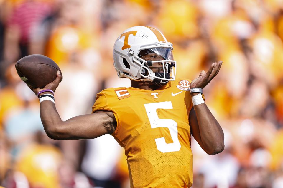 Tennessee quarterback Hendon Hooker (5) throws to a receiver during the first half of an NCAA college football game against Alabama Saturday, Oct. 15, 2022, in Knoxville, Tenn. (AP Photo/Wade Payne)