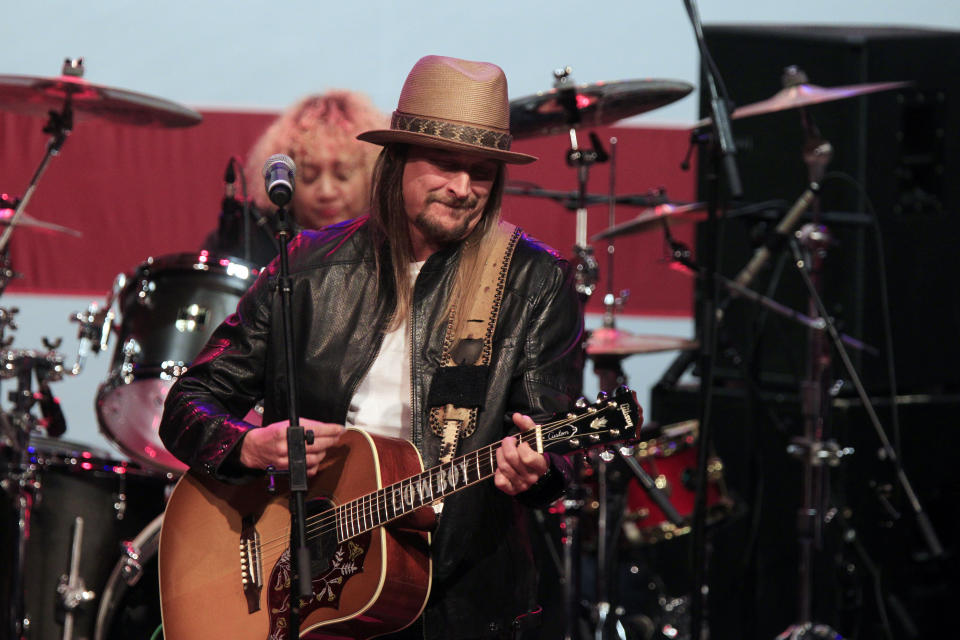 Kid Rock performs for Republican presidential candidate, former Massachusetts Gov. Mitt Romney, at the Royal Oak Music Theatre in Royal Oak, Mich., Monday, Feb. 27, 2012. (AP Photo/Carlos Osorio)