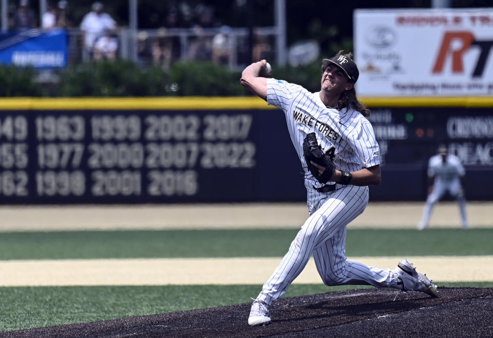 Wake Forest pitcher Rhett Lowder (4) throws a pitch during the second inning of an NCAA college baseball tournament super regional game against Alabama on Saturday, June 10, 2023, in Winston-Salem, N.C. (AP Photo/Matt Kelley)