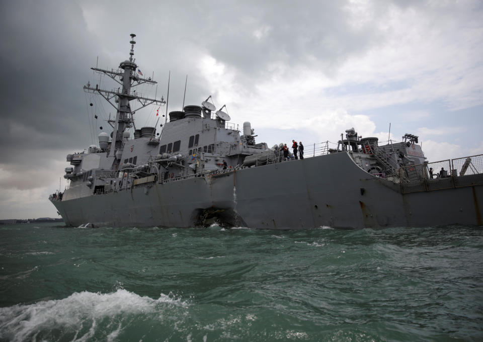 <p>The U.S. Navy guided-missile destroyer USS John S. McCain is seen after a collision, in Singapore waters Aug. 21, 2017. (Photo: Ahmad Masood/Reuters) </p>