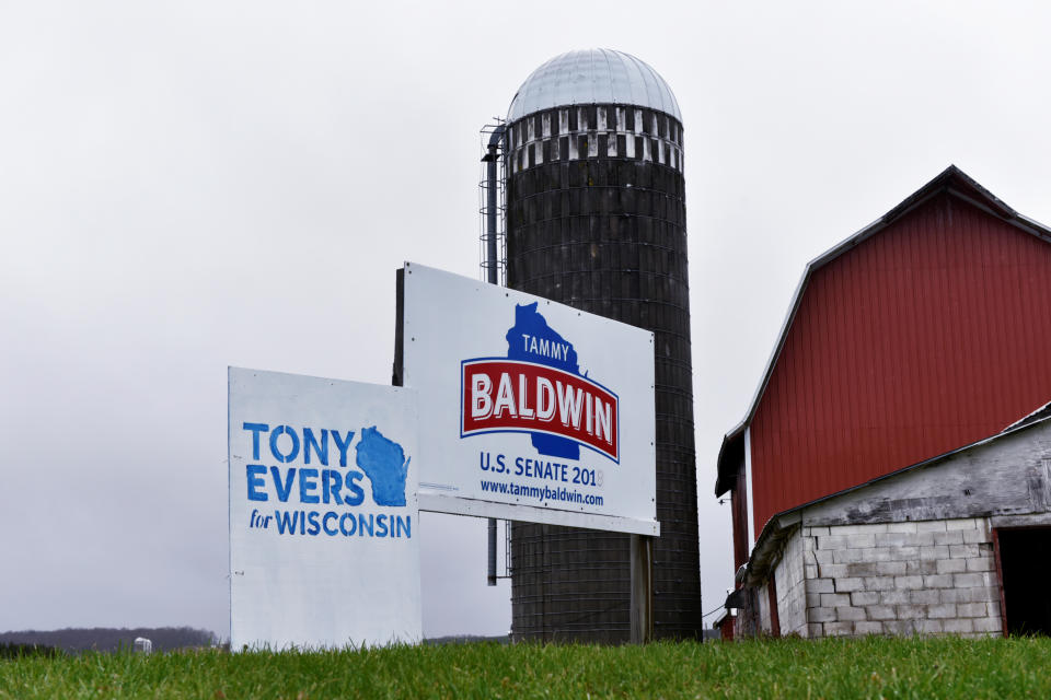 Signs for Tony Evers and Tammy Baldwin 