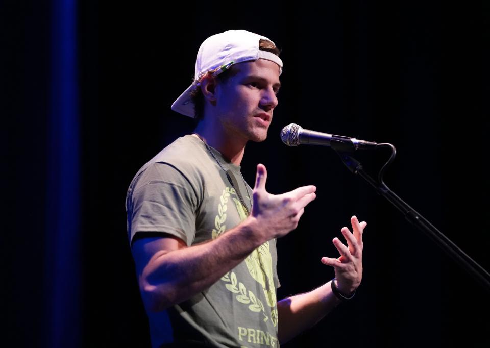 Cody Goodwin tells his story during the Des Moines Register's Storytellers Project at Hoyt-Sherman Place in Des Moines on Tuesday, Oct. 25, 2022.