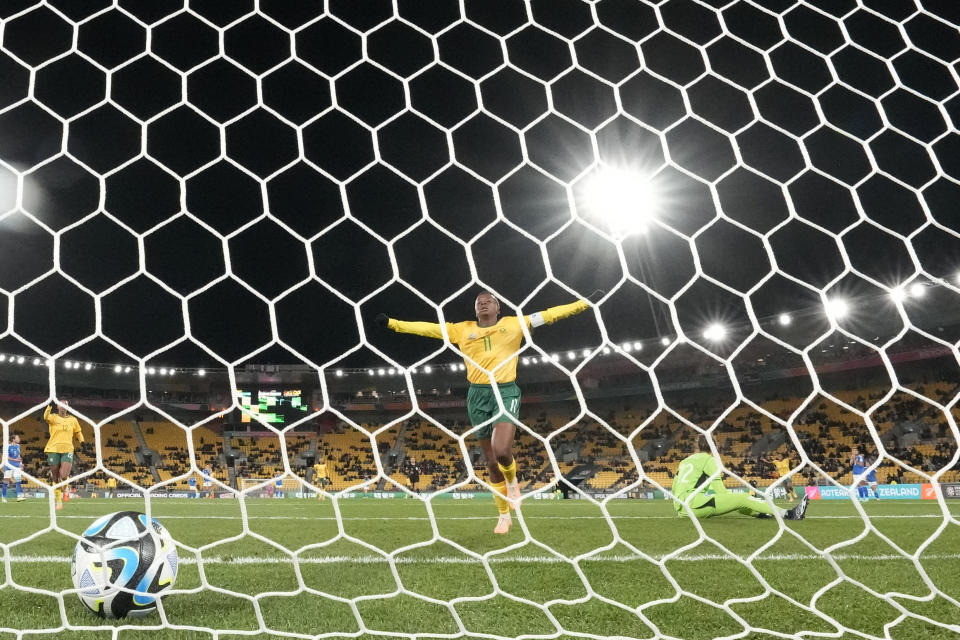 South Africa's Thembi Kgatlana celebrates after an own-goal scored by Italy's Benedetta Orsi, far right, during the Women's World Cup Group G soccer match between South Africa and Italy in Wellington, New Zealand, Wednesday, Aug. 2, 2023. (AP Photo/Alessandra Tarantino)