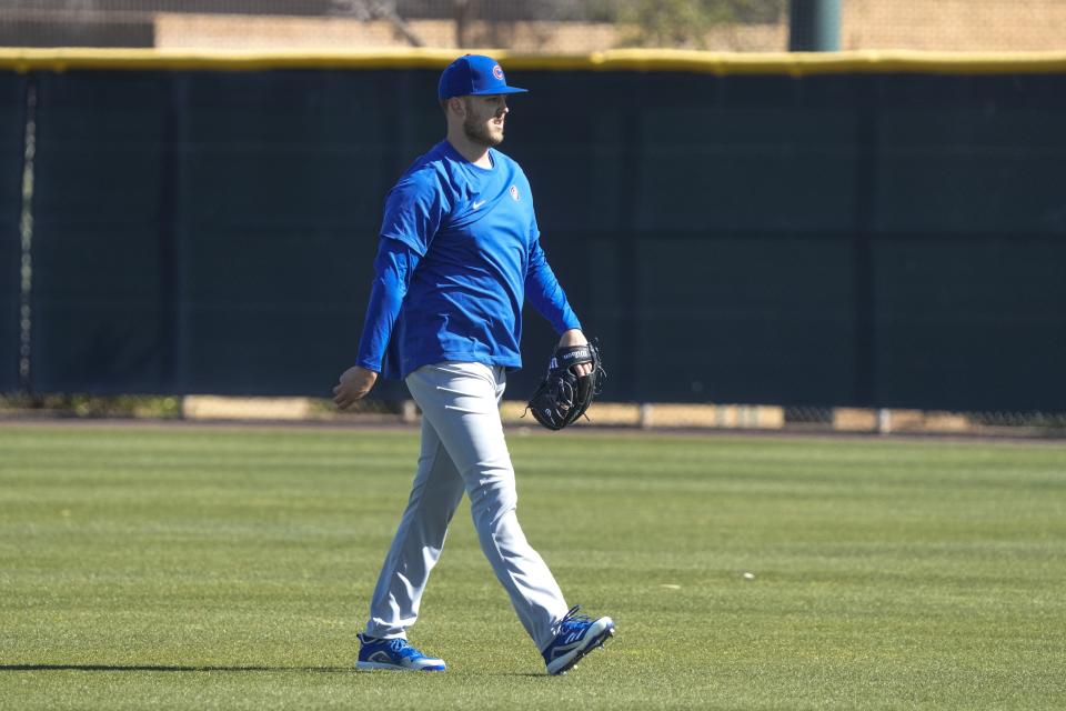 Chicago Cubs' Jameson Taillon walks during a spring training baseball workout Wednesday, Feb. 15, 2023, in Mesa. (AP Photo/Morry Gash)