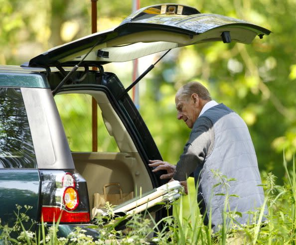 Prince Philip unloading his trunk