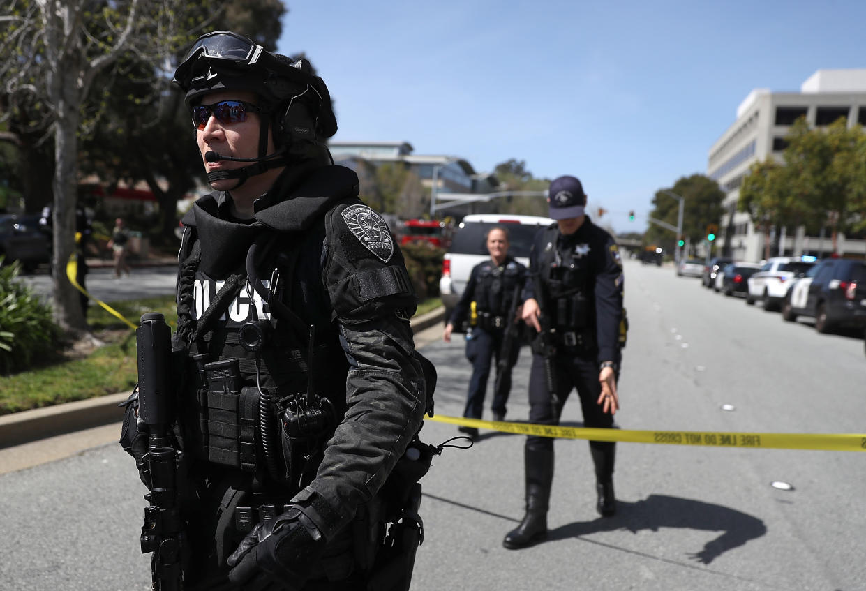 Law enforcement officers are seen outside YouTube headquarters in San Bruno, Calif., on Tuesday. (Photo: Justin Sullivan/Getty Images)