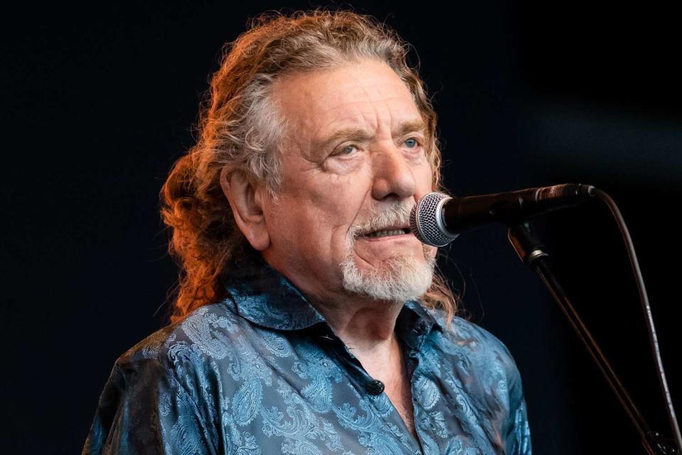 <p>Samir Hussein/WireImage</p> Robert Plant performs in Glastonbury in June 2023