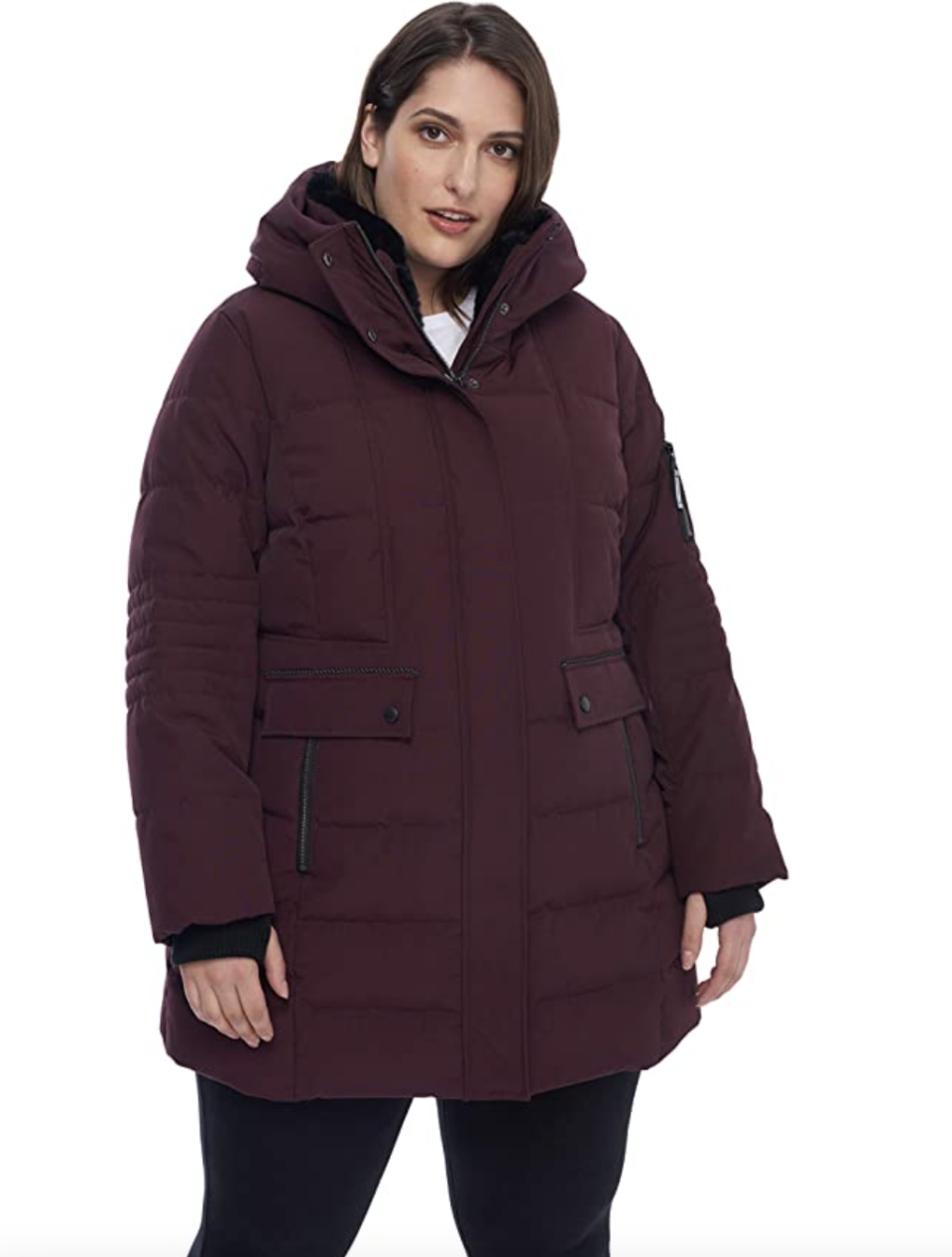 brunette plus size model in burgundy Alpine North Vegan Down Mid-Length Parka Coat 