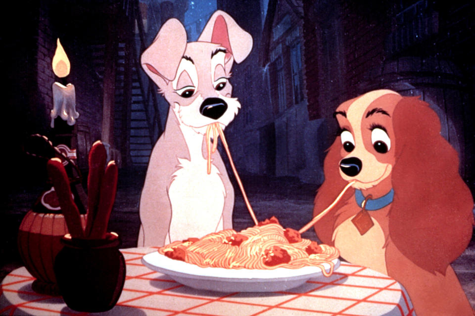 Lady and the Tramp eating spaghetti together