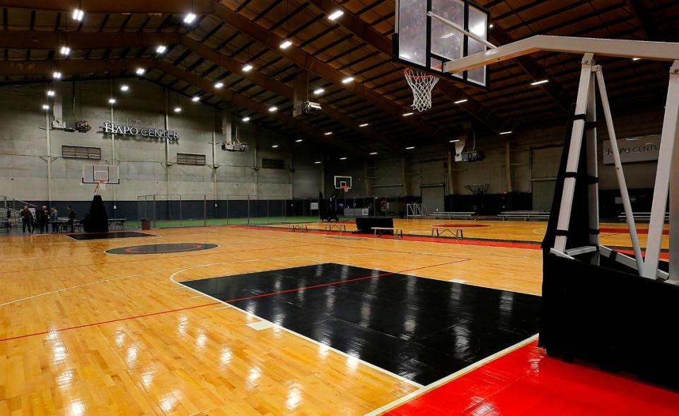 A pair of basketball courts for Clubhouse Sports Academy sit in the middle of the arena space inside the HAPO Center at 6600 Burden Blvd in Pasco.