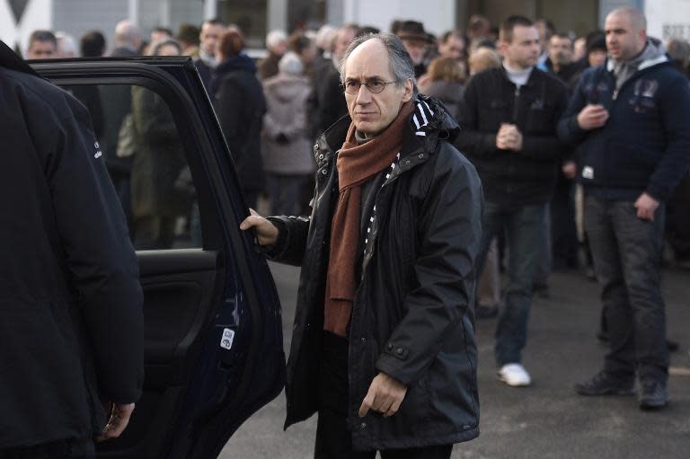 Charlie Hebdo editor-in-chief Gerard Biard arrives for the funeral of French cartoonist and Charlie Hebdo editor Stephane "Charb" Charbonnier, on January 16, 2015 in Pontoise, outside Paris