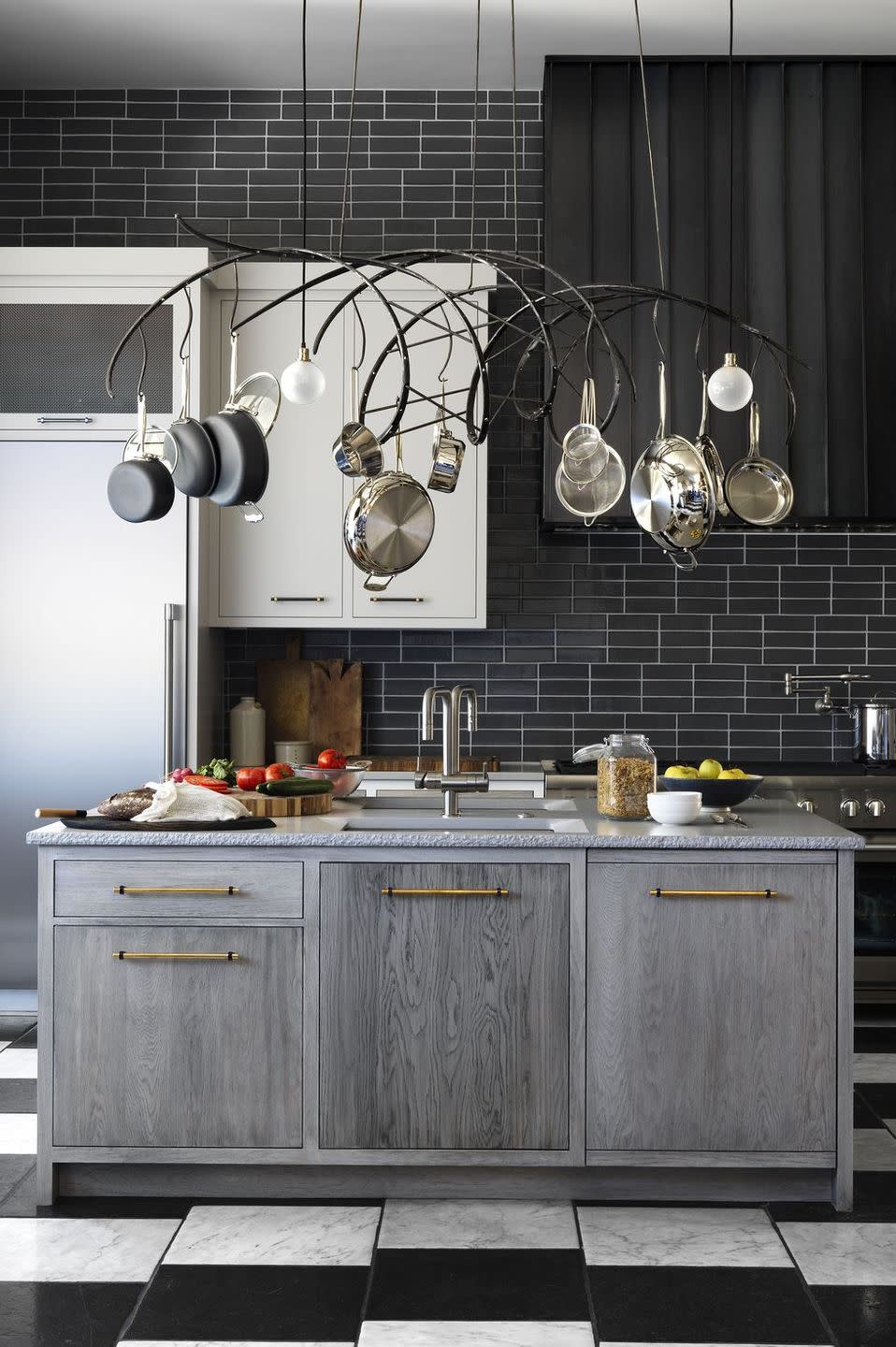 modern kitchen with checkered floor and pot rack