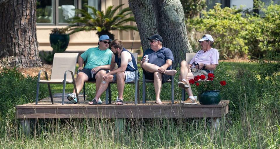 A group of spectators take advantage of their view across from the 16th green during the second round of the RBC Heritage Presented by Boeing at Harbour Town Golf Links on Friday, April 19, 2024 in Sea Pines on Hilton Head Island. Eston Parker III/for The Island Packet